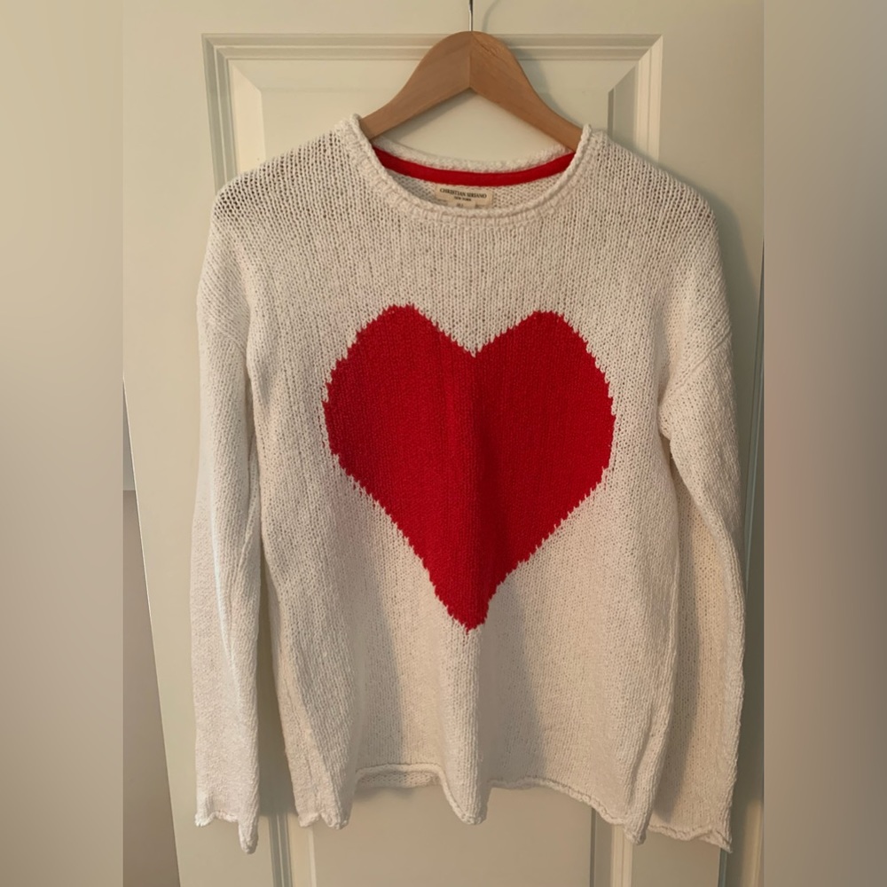 Like new- size small but wears like a medium knit sweater